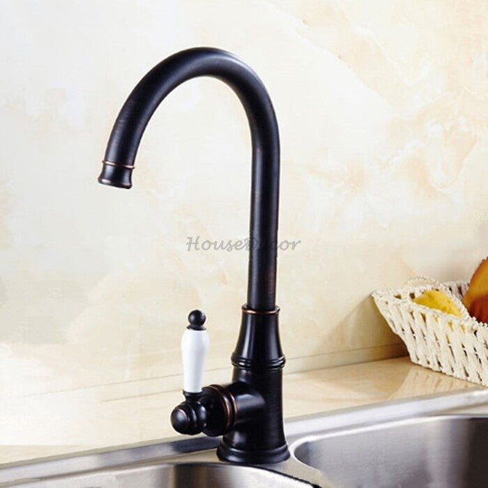 Modern kitchen sink mixer tap swivel spout detail view