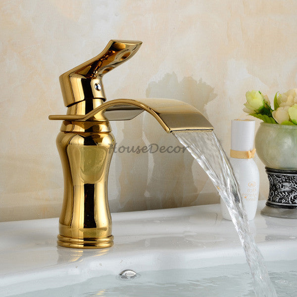 Gold bath shower mixer tap waterfall spout detail view