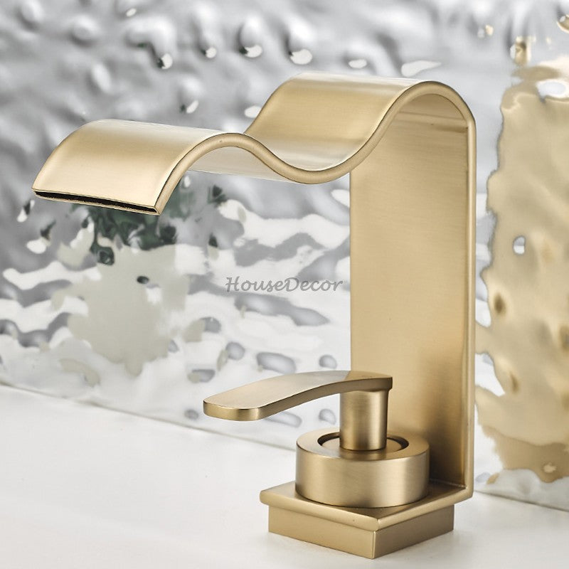 Modern Brass bath shower mixer tap waterfall spout detail view