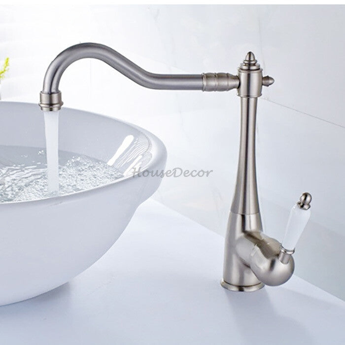 Modern kitchen sink mixer tap swivel spout detail view