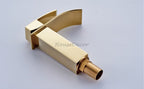 Gold bath shower mixer tap waterfall spout detail view