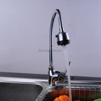 Chrome kitchen sink mixer tap swivel spout detail view