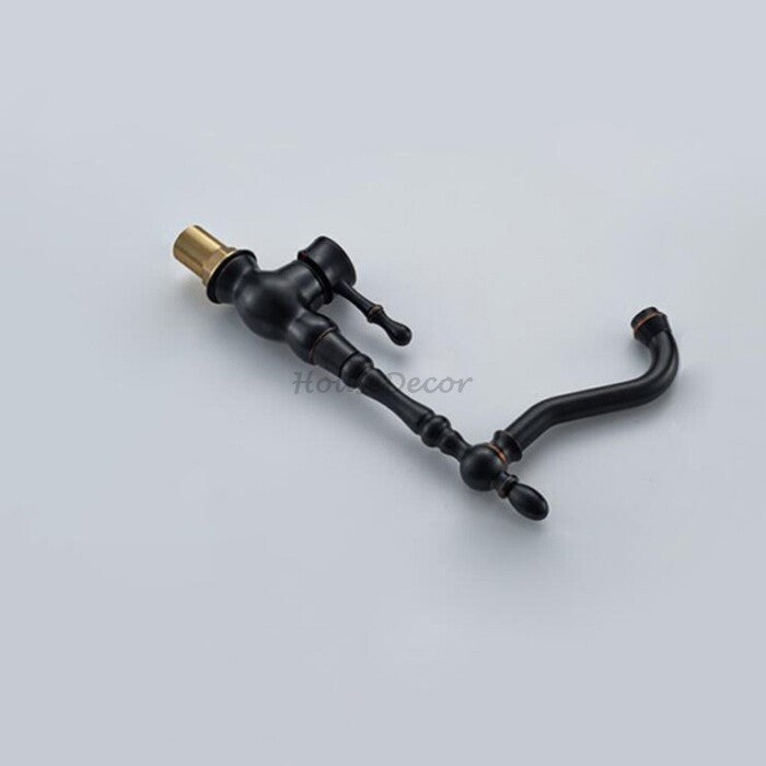 Black kitchen sink mixer tap swivel spout detail view