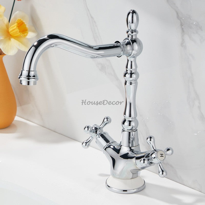 Gold bathroom basin mixer tap swivel spout detail view