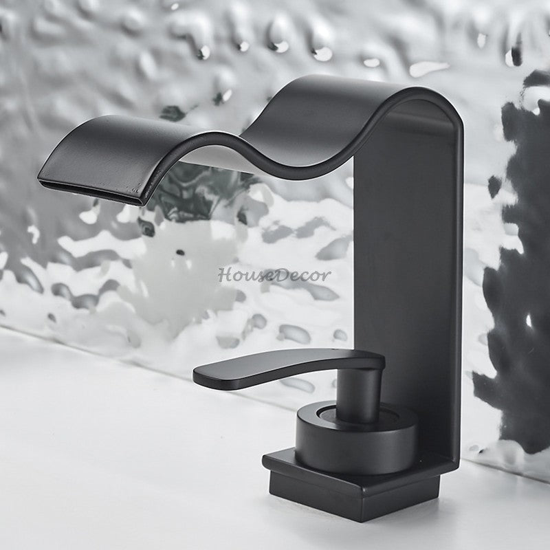 Modern Brass bath shower mixer tap waterfall spout detail view
