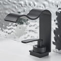 Modern Brass bath shower mixer tap waterfall spout detail view