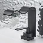 Modern Brass bath shower mixer tap waterfall spout detail view