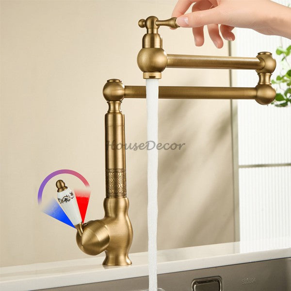 Modern kitchen sink mixer tap swivel spout detail view