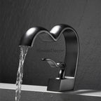 Modern bath shower mixer tap waterfall spout detail view
