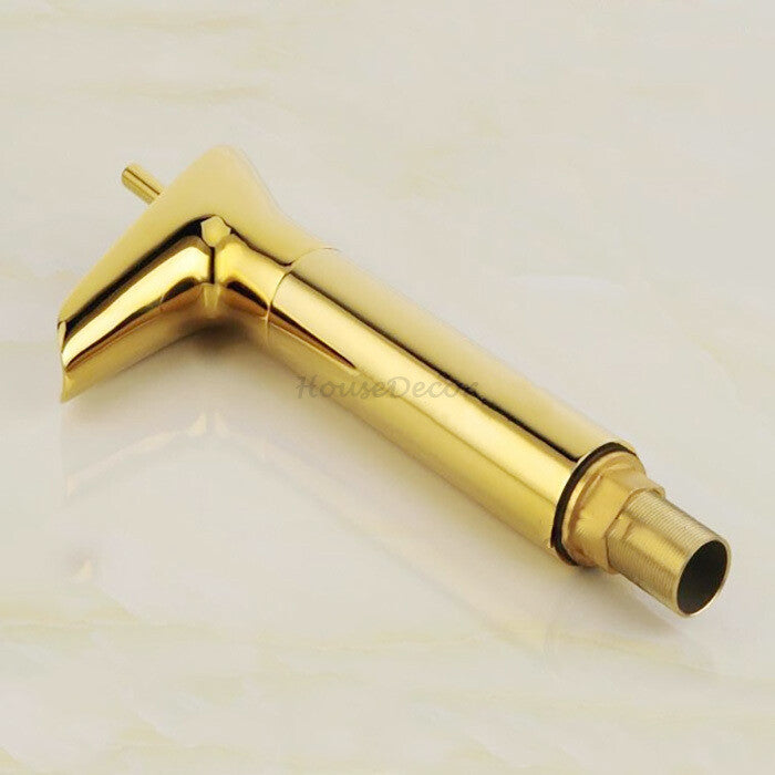 Gold bathroom basin mixer tap waterfall spout detail view