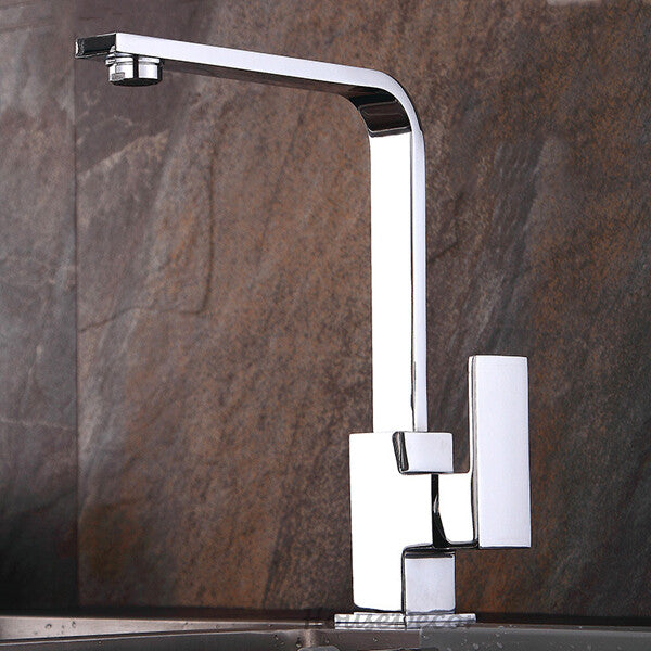 Brass kitchen sink mixer tap swivel spout detail view