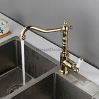Gold Ceramic kitchen sink mixer tap swivel spout detail view