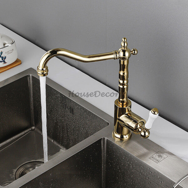 Gold Ceramic kitchen sink mixer tap swivel spout detail view