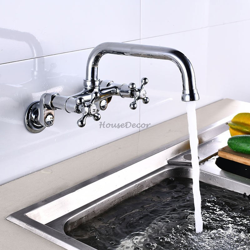 Modern kitchen sink mixer tap swivel spout detail view