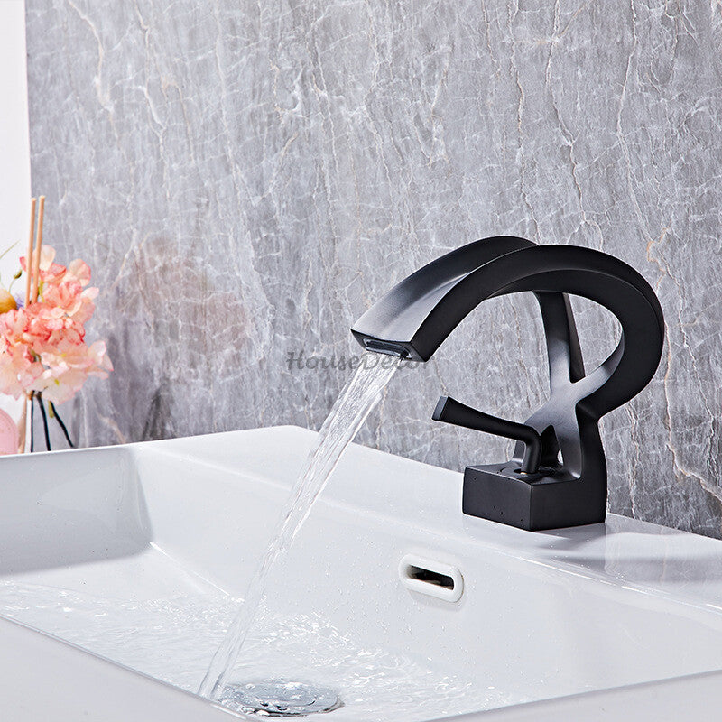 Modern Brass bath shower mixer tap waterfall spout detail view