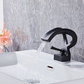 Modern Brass bath shower mixer tap waterfall spout detail view