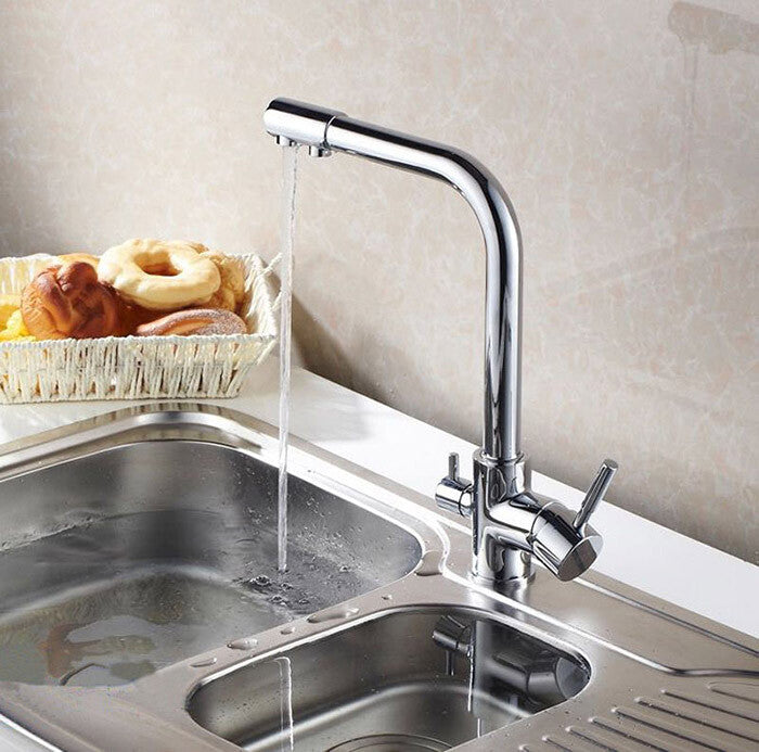 Modern kitchen sink mixer tap swivel spout detail view