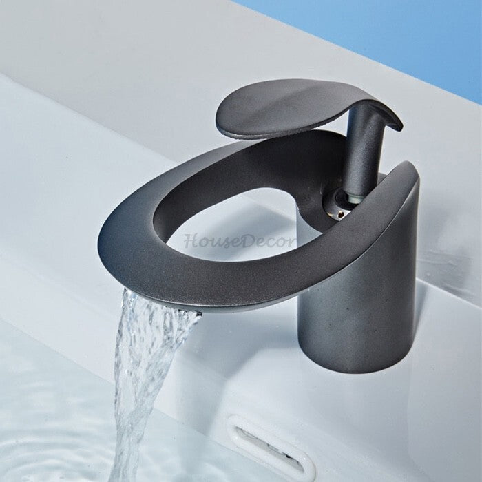 Modern bath shower mixer tap waterfall spout detail view