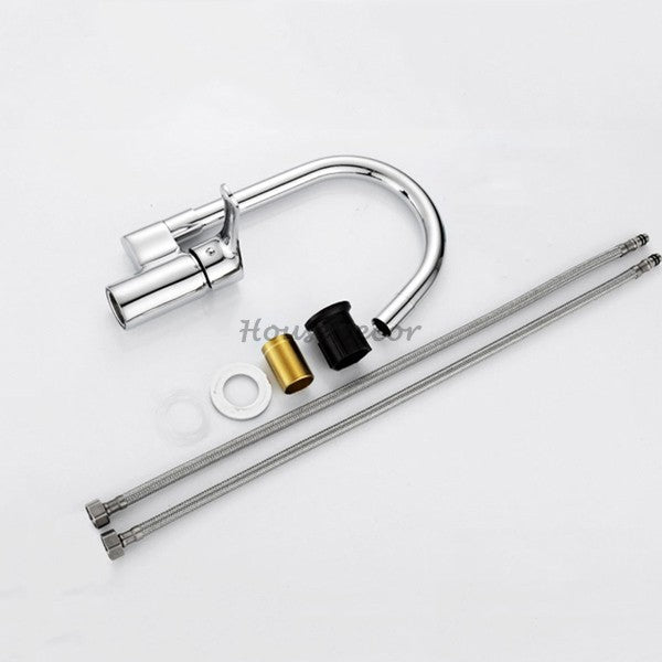 Modern kitchen sink mixer tap swivel spout detail view