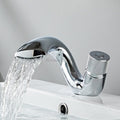 Brass bathroom basin mixer tap waterfall spout detail view