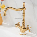 Gold bathroom basin mixer tap swivel spout detail view