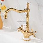 Gold bathroom basin mixer tap swivel spout detail view