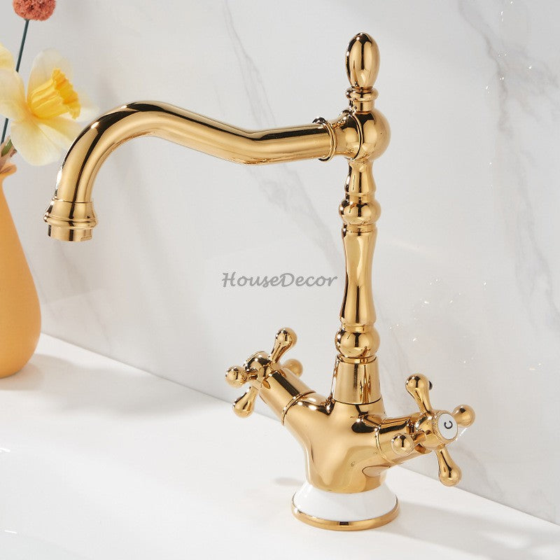 Gold bathroom basin mixer tap swivel spout detail view