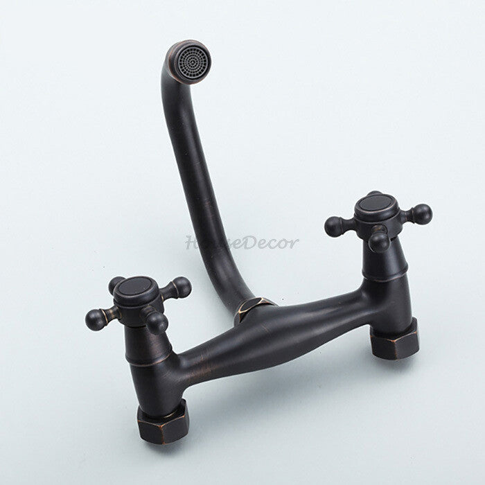 Black kitchen sink mixer tap swivel spout detail view