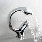 Modern bathroom basin mixer tap waterfall spout detail view