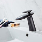 Modern bath shower mixer tap waterfall spout detail view