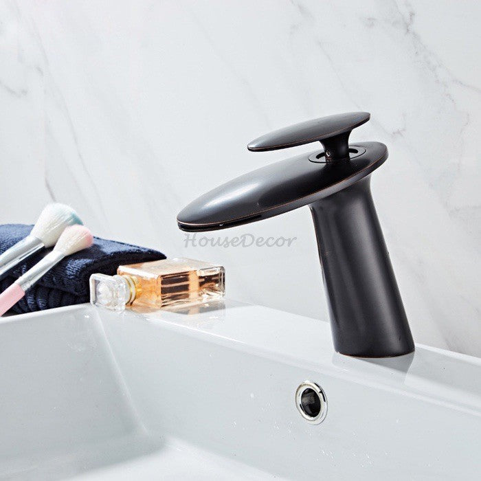 Modern bath shower mixer tap waterfall spout detail view