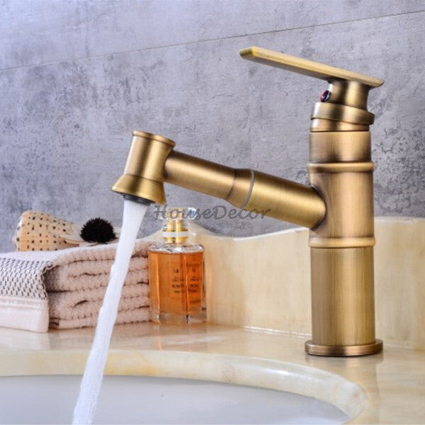 Antique Brass bathroom basin mixer tap pull out spray detail view