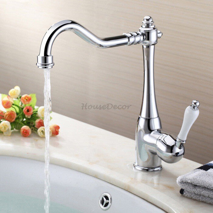 Modern kitchen sink mixer tap swivel spout detail view