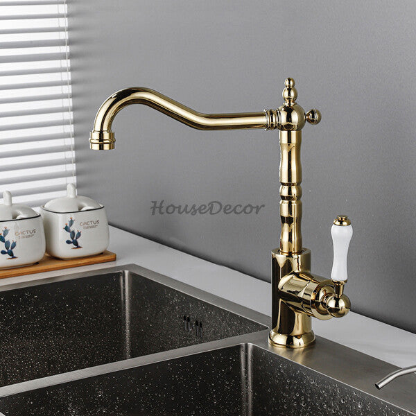 Gold Ceramic kitchen sink mixer tap swivel spout detail view