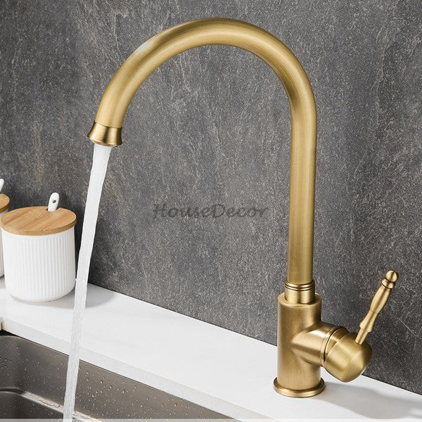 Modern Brass kitchen sink mixer tap swivel spout detail view