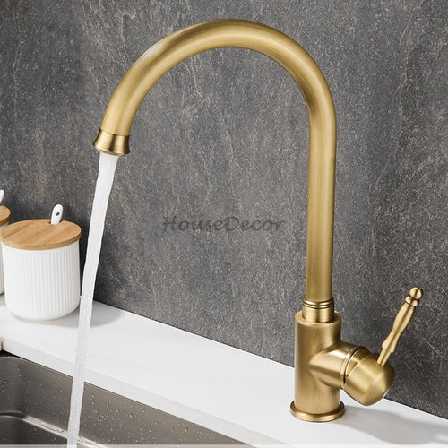 Modern Brass kitchen sink mixer tap swivel spout detail view