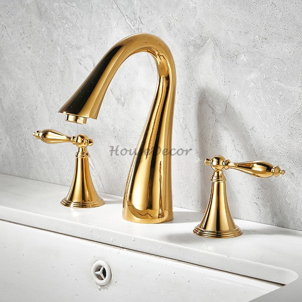 Gold Brass bathroom basin mixer tap dual handle control detail view