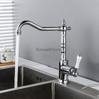 Chrome kitchen sink mixer tap swivel spout detail view
