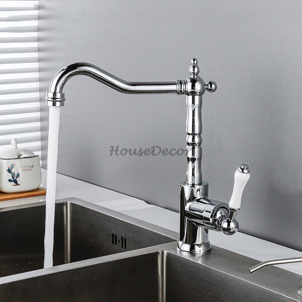 Chrome kitchen sink mixer tap swivel spout detail view