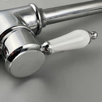 Chrome Ceramic kitchen sink mixer tap swivel spout detail view