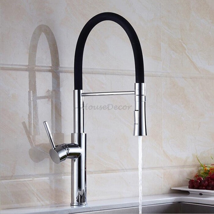 Modern kitchen sink mixer tap swivel spout detail view