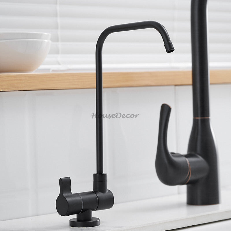 Modern kitchen sink mixer tap swivel spout detail view