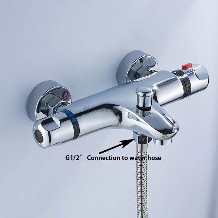 Modern bath shower mixer tap thermostatic control detail view