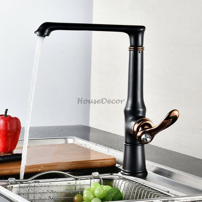 Black Brass kitchen sink mixer tap swivel spout detail view