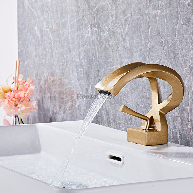 Modern Brass bath shower mixer tap waterfall spout detail view