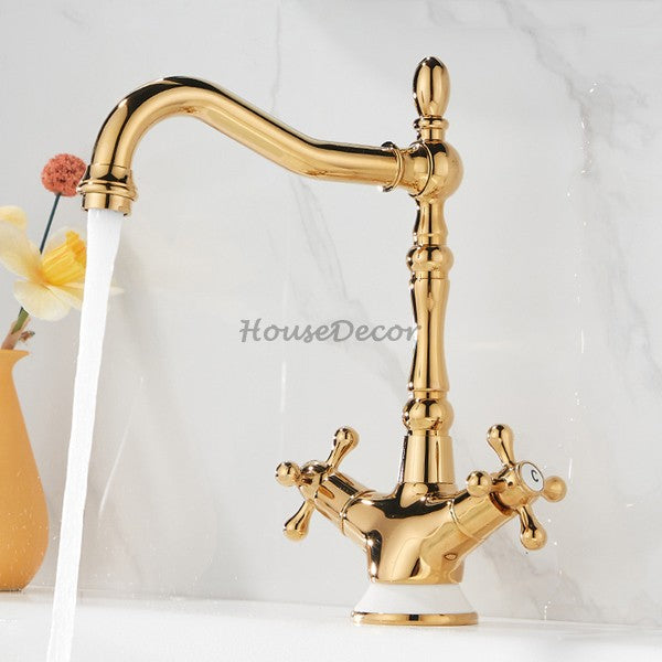 Gold bathroom basin mixer tap swivel spout main view