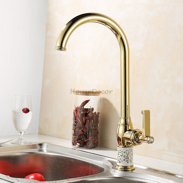 Gold kitchen sink mixer tap swivel spout main view
