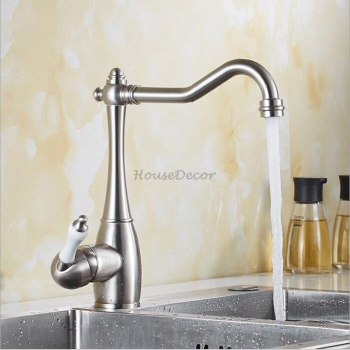 Modern kitchen sink mixer tap swivel spout detail view
