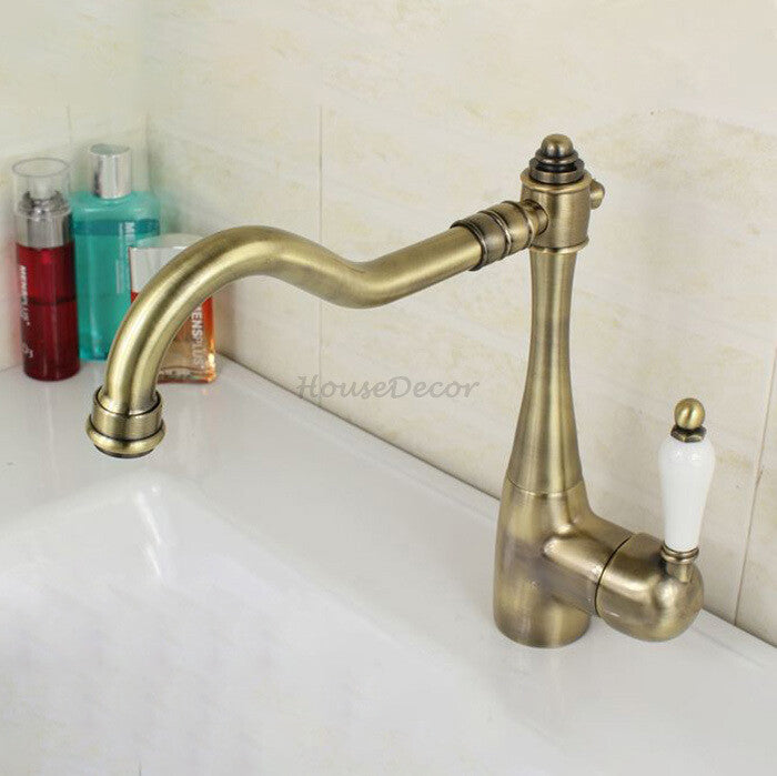 Bronze Ceramic kitchen sink mixer tap swivel spout detail view
