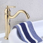 Gold bath shower mixer tap swivel spout detail view